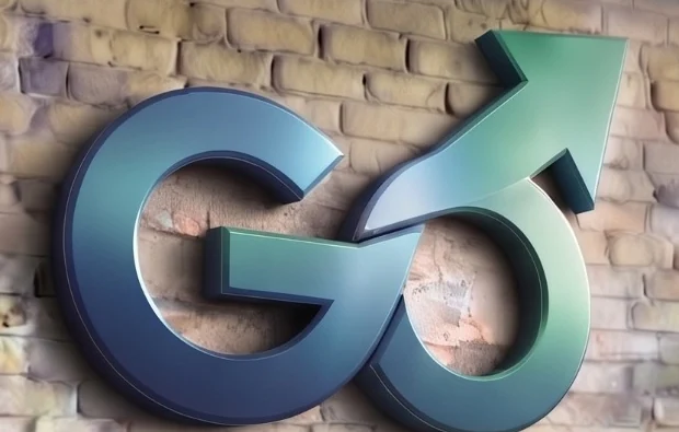 Símbolo GO de Web de tu Comercio sobre una pared de ladrillo